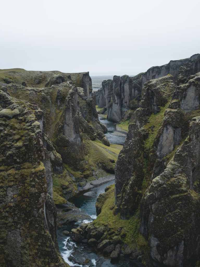 A rocky, grass covered canyon
