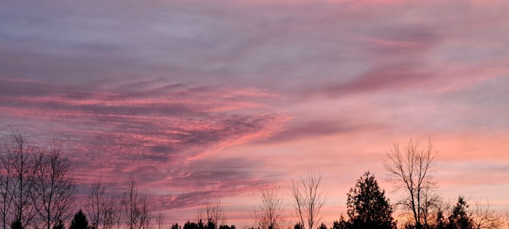 An early morning in December 2025, with pink, blue and purple clouds