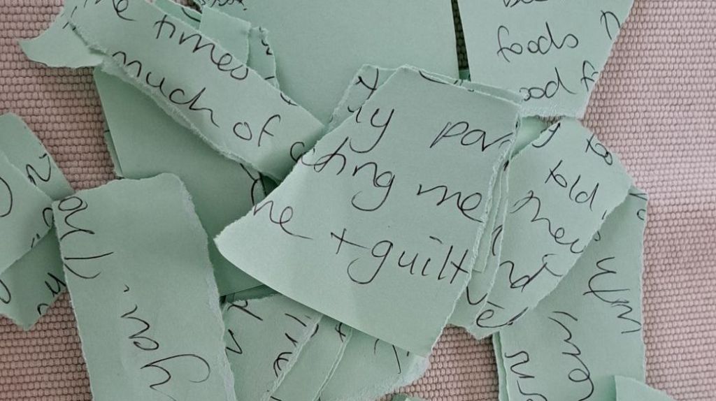 Wordson green paper, all torn up