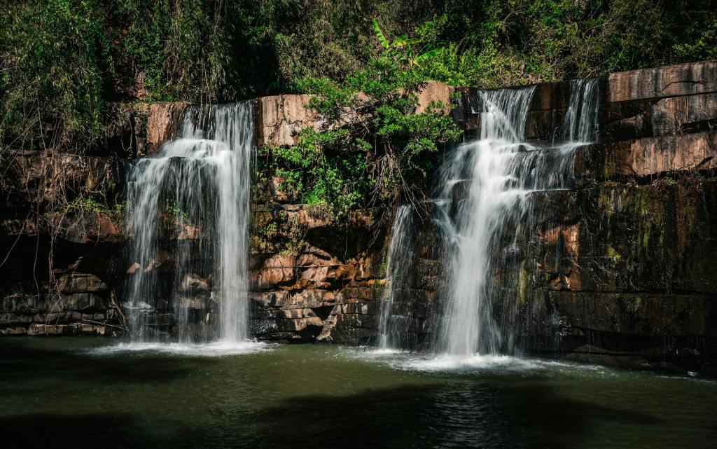 A cliff face with waterfalls